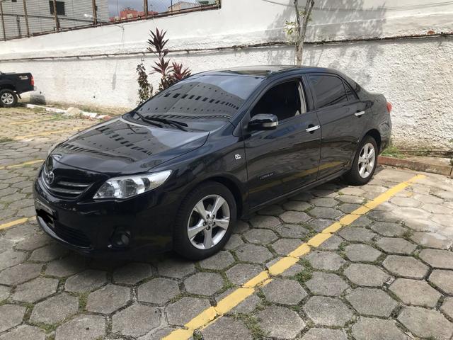 Vendo Corolla Xei 13/14 - Ipva até maio/2021 - Foto 2