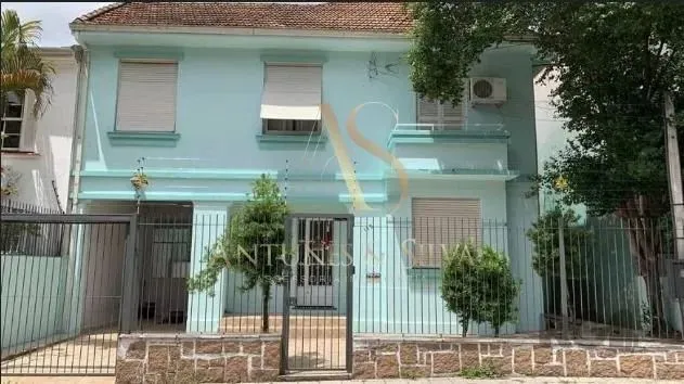 Sobrado com 3 dormitórios para alugar, 270 m² por R$ 10.200,00/mês - Auxiliadora - Porto A
