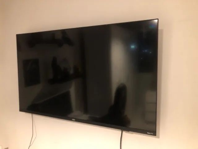 Tv 42 Aoc nova pouco mais de um ano uso 