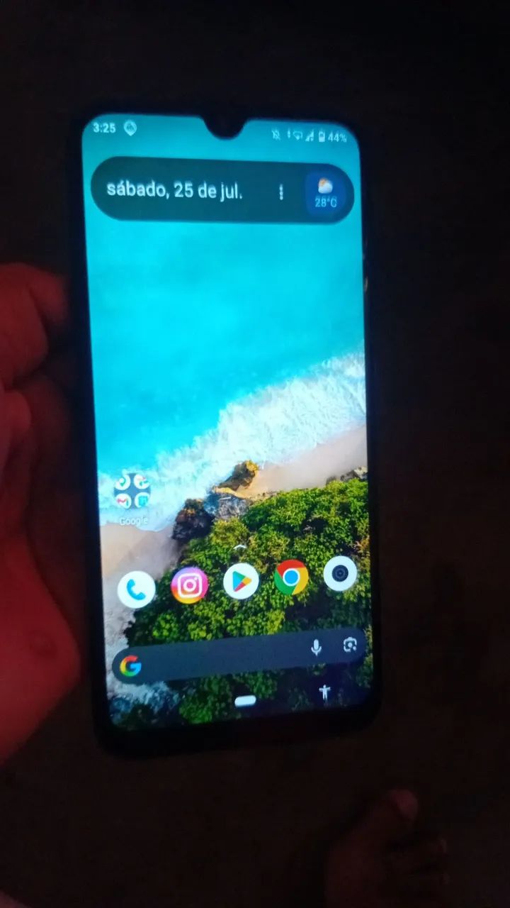 Celular  bom com apenas marca de uso 