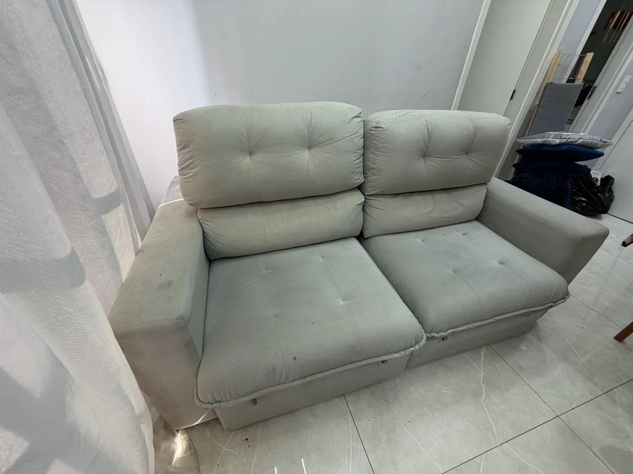 Sofá retrátil 1,96 perfeito estado vira cama 