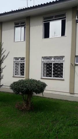 Apartamento terrio com garagem.Trevo Atuba
