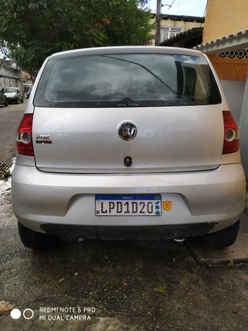 Fox 2005 com GNV, vidros elétricos e DOC ok