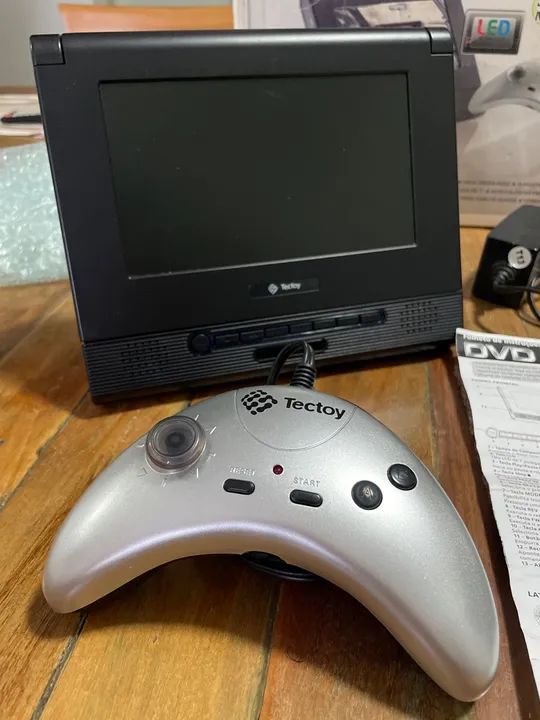Tectoy DVD Mobile DVT-T6000 12 jogos na memória (envio Olx pay) - Foto 2