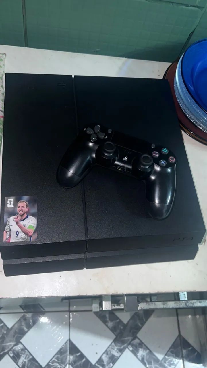 Vendo ps4 com jogos