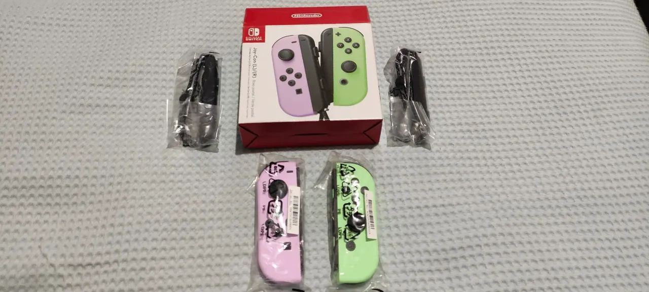  Joy con Nintendo switch na cor verde e roxo pastel  - Foto 2
