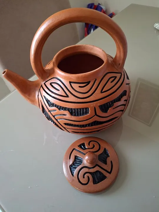 Par de jarros de cerâmica. R$100,00 o par.