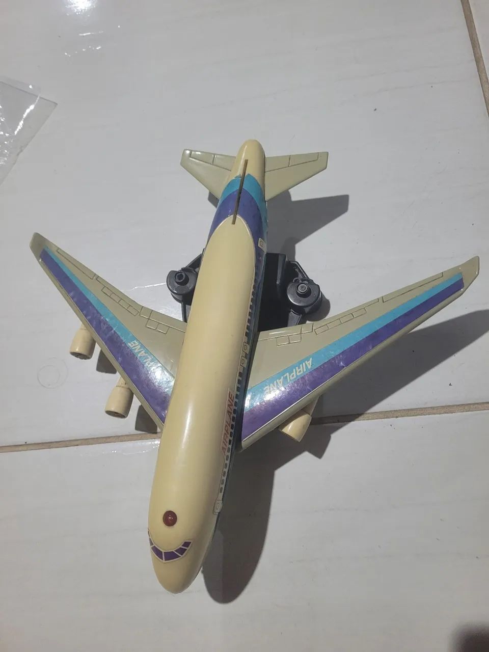 Brinquedo antigo aviao funciona