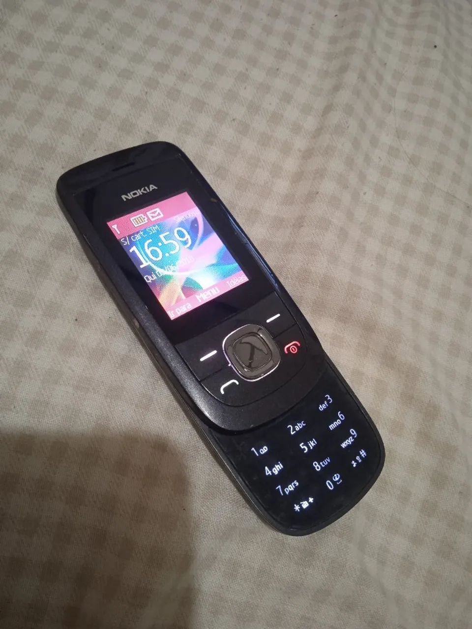 Tel Cel Nokia antigo funcionando perfeitamente com carregador 