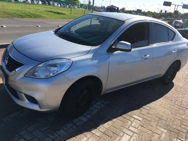 Versa sv 2013 aceito troco por caminhão