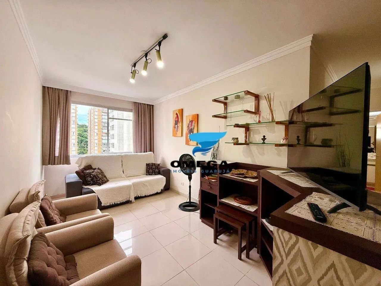 Apartamento à venda na praia das Pitangueiras no Guarujá I Omega Imoveis