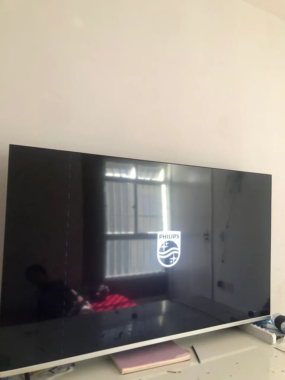 Vende-se smart tv 58 polegadas, Com algumas listras na tela