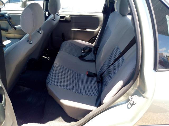 Gm corsa sedan classic 1.0 8v 2010 verde excelente estado - Foto 7