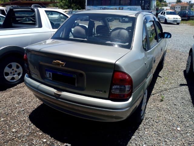 Gm corsa sedan classic 1.0 8v 2010 verde excelente estado - Foto 3