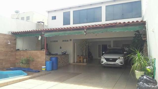 Setor Oeste QD 09, Sobrado 6qts (2 suites), piscina churrasqueira lote 275m² R$ 595.000