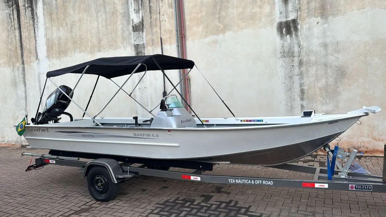 Lancha marfim 6.0 + motor 60hp Mercury 