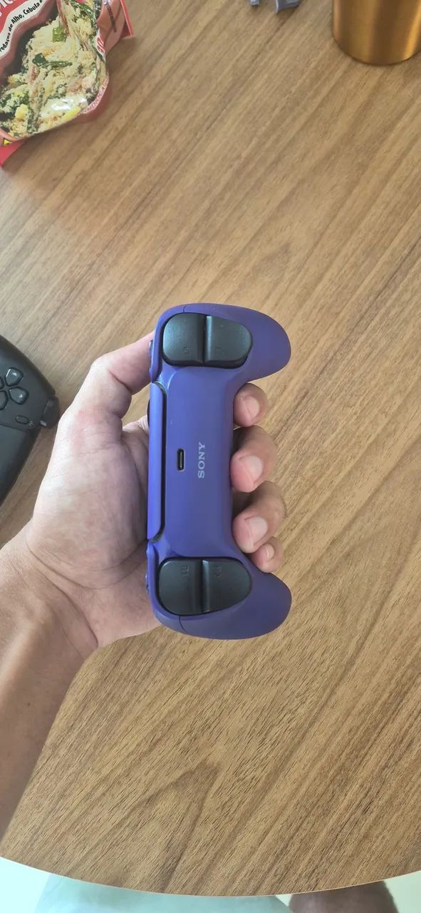 Controles Dualsense roxo e preto - Foto 5