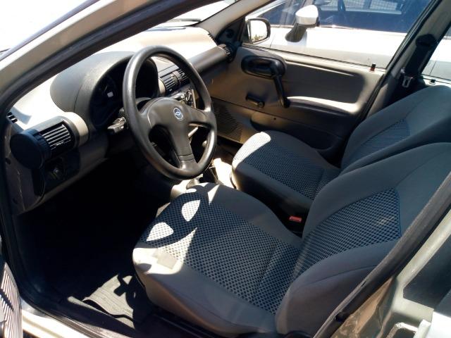 Gm corsa sedan classic 1.0 8v 2010 verde excelente estado - Foto 9