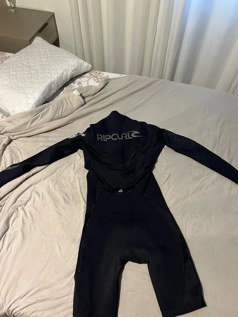 Macacão de neoprene Rip Curl para surfe