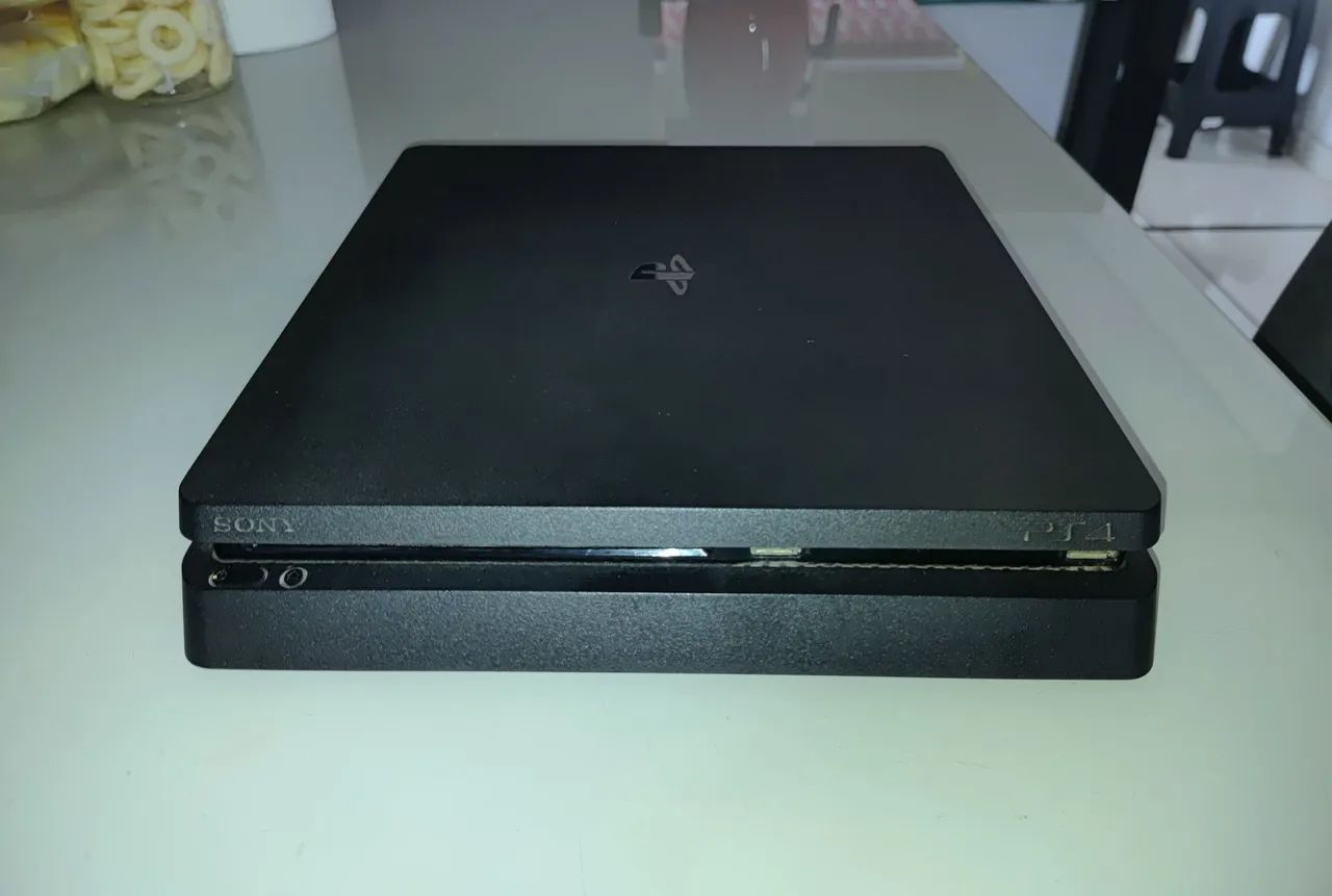 PS4 + 2 Manetes e 2 jogos - Foto 4