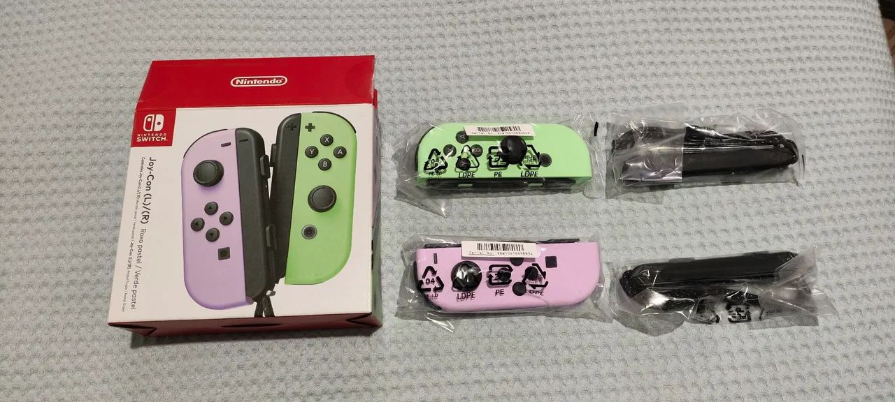  Joy con Nintendo switch na cor verde e roxo pastel  - Foto 3