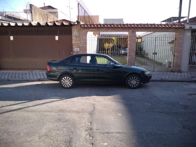 Vectra cd 97 com motor retificado, ABS, teto solar, sensor de ré e controle de tração! - Foto 6