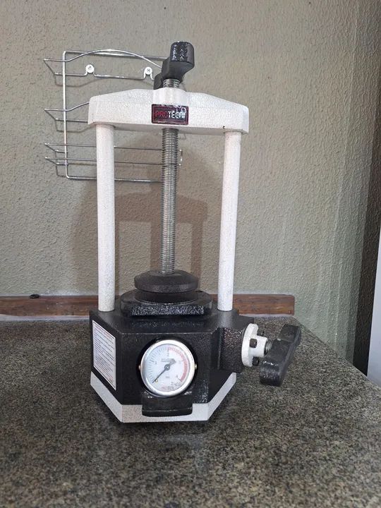 Prensa para prótese dentária