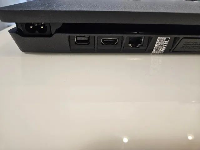 Playstation 4 slim 1tb + 2 controles, gran turismo e ace combat - Foto 2