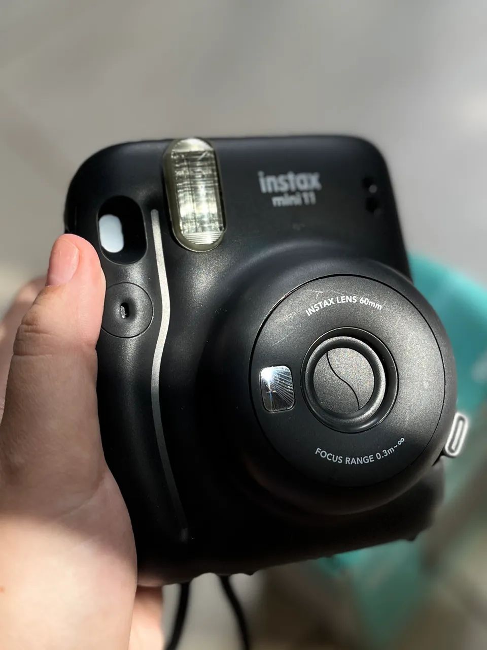 Câmera instax 11 preta