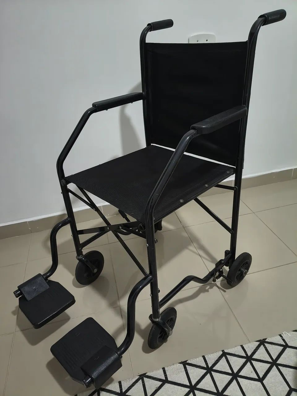 Cadeira de rodas.