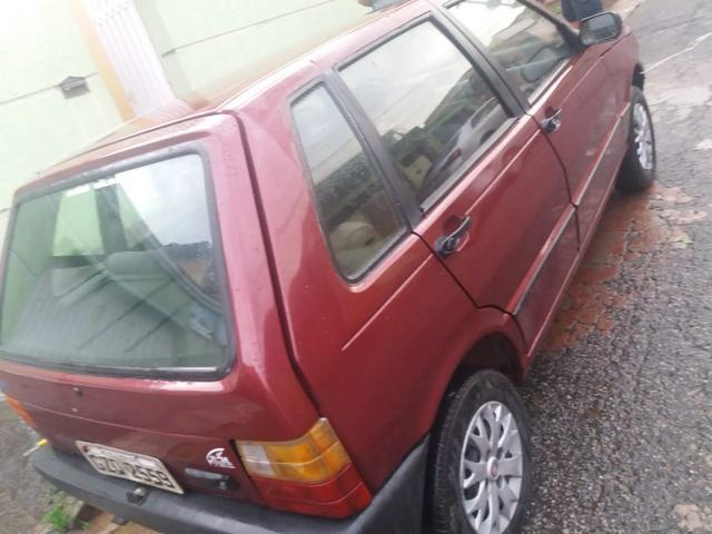 Vendo uno 2004 1.0 fire 4 portas contato: * - Foto 5