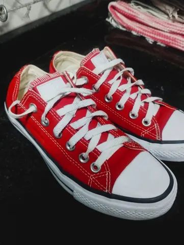 Tenis store vermelho renner