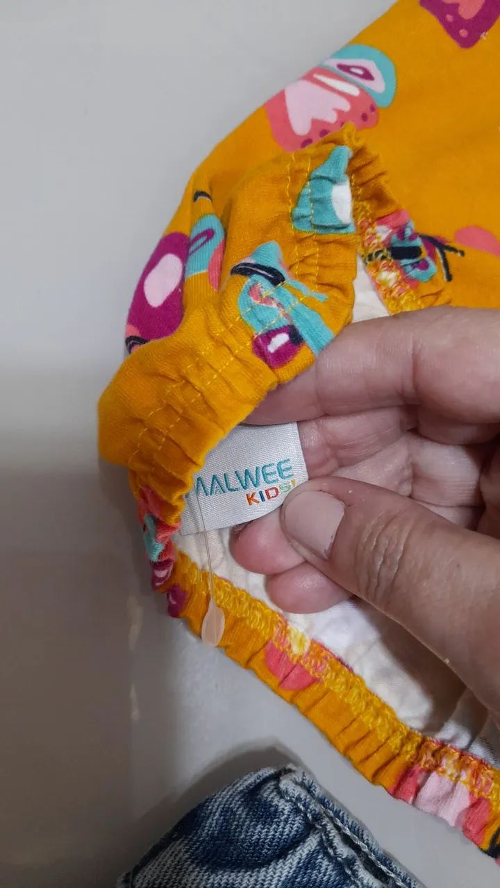 Vendo Conjunto Blusa Malwe kids e saia jeans seminovo T- 10 anos - Foto 3