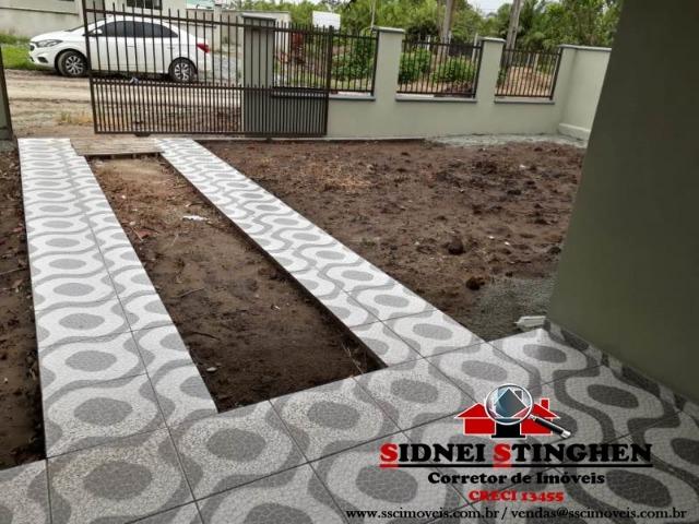 Casa novinha na Praia! Terreno todo murado, amplo espaço nos fundos - Foto 13