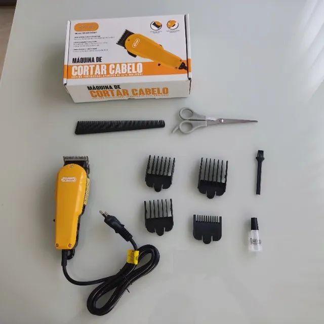 Máquina de Cortar Cabelo Knup 220V Profissional com 4 pentes - Foto 2
