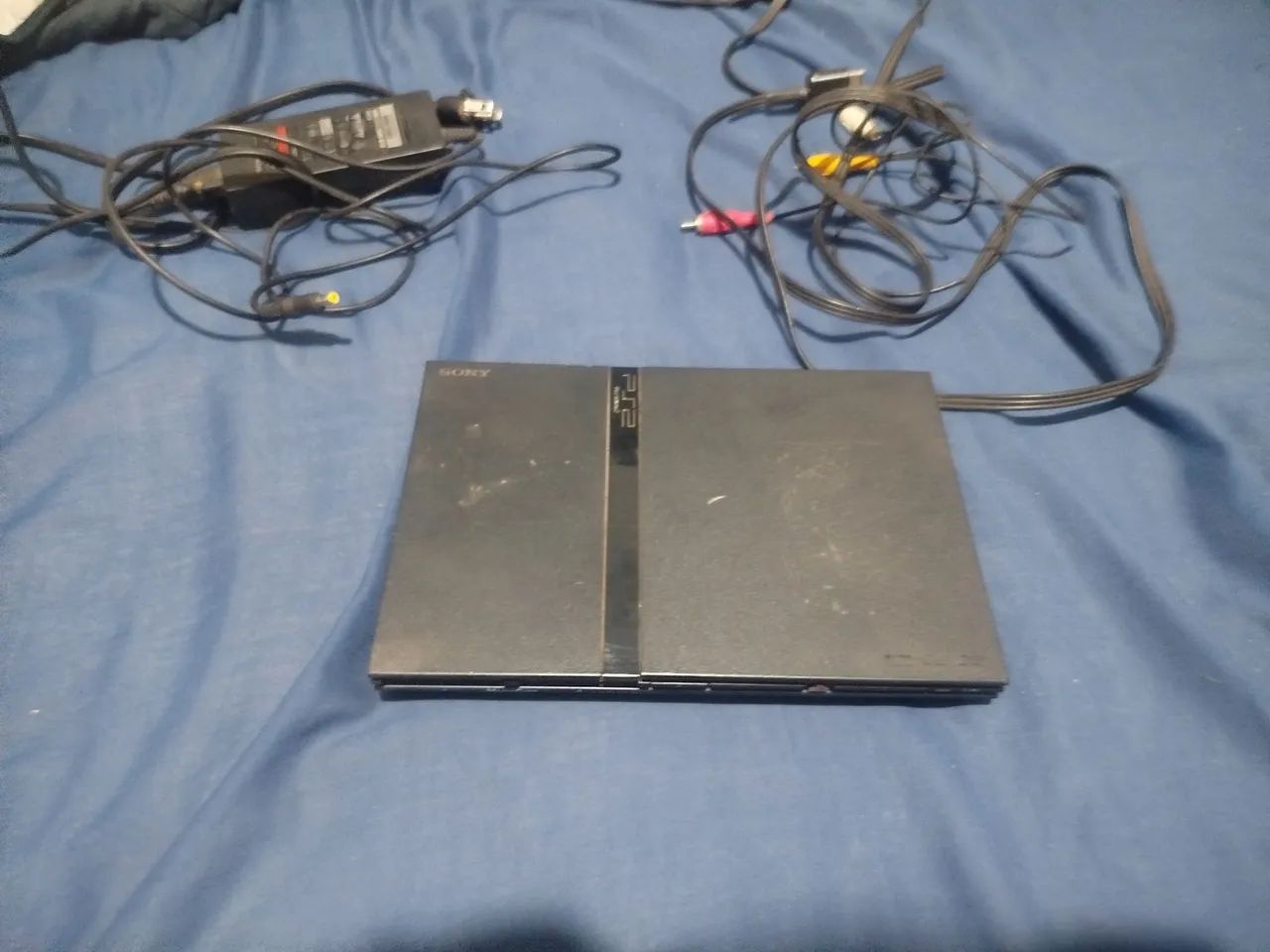 PS2, original e travado 