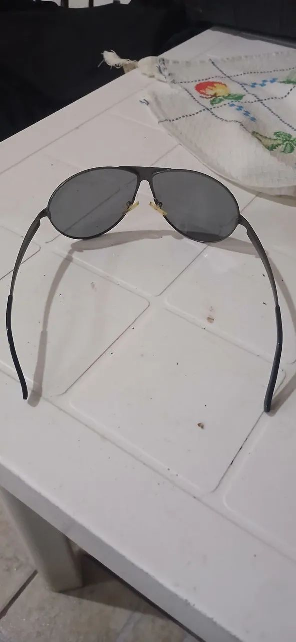 Óculos Triton Titanium lente polarizada em ótimo estado  - Foto 4