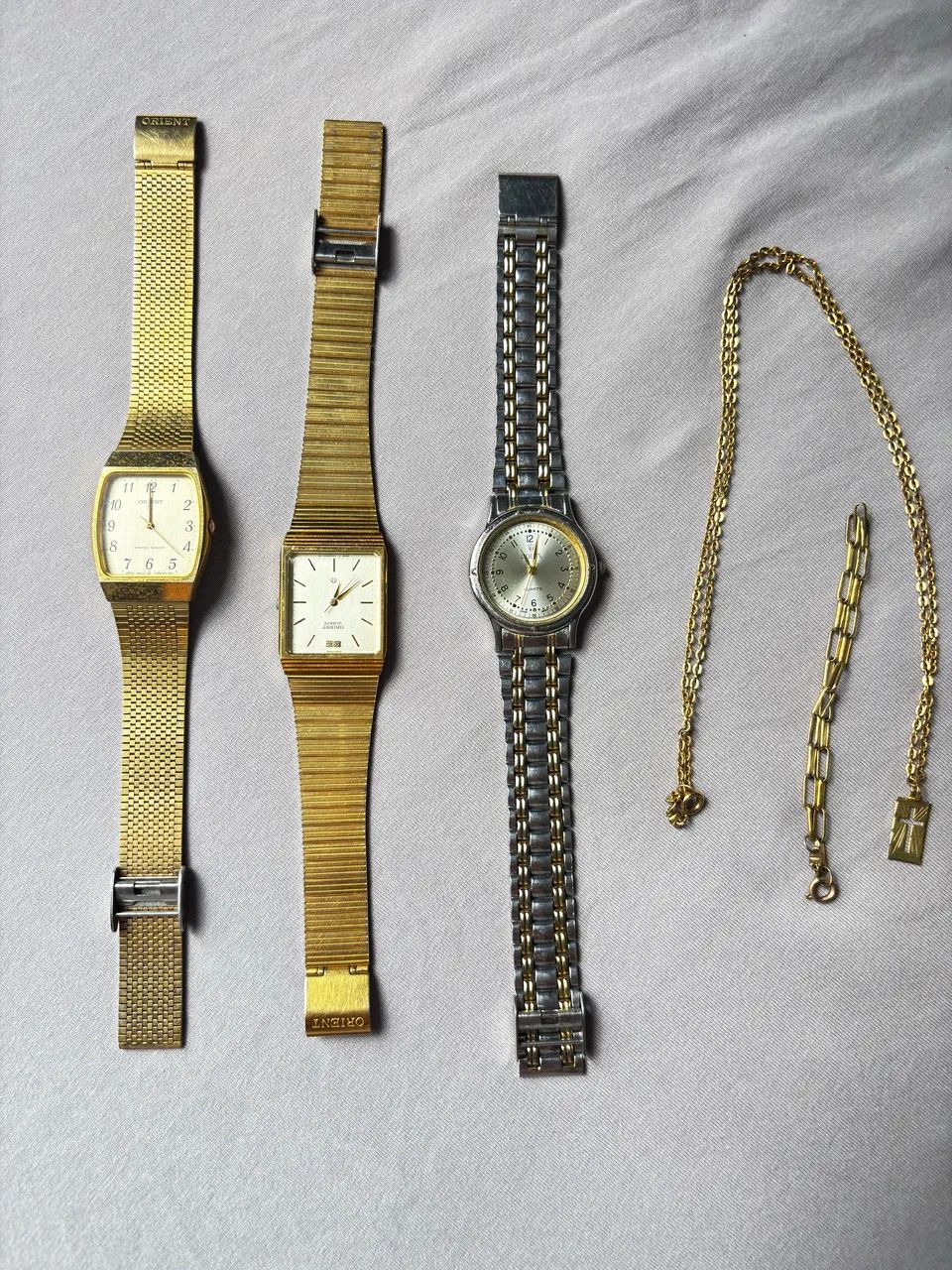 Relógio, corrente e pulseira 