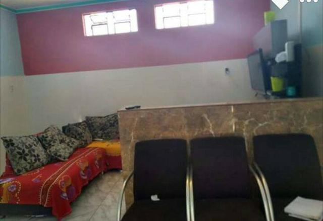 Casa com três quartos, suíte, garagem, área de serviço - Foto 2