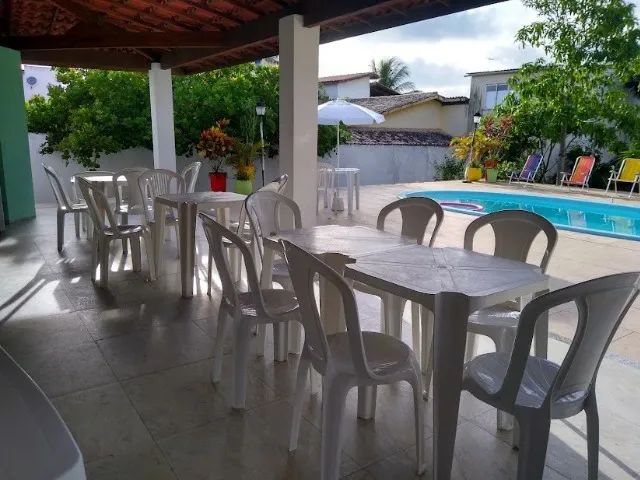 7/4 6 suites  5 c/ar  wi-fi 900m praia piscina churrasqueira  área verde 7 vagas  garagem  - Foto 3