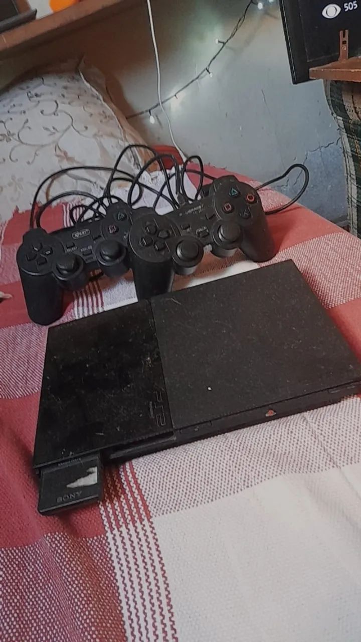 ps2 dois controles (ja com os fios) aceito troca de preferencia ou em bike ou celular