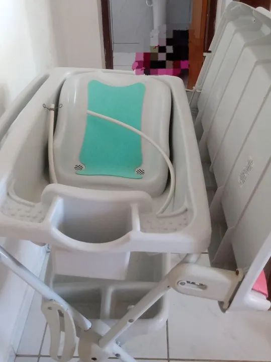 Banheira cm trocador ,usada poucas vezes