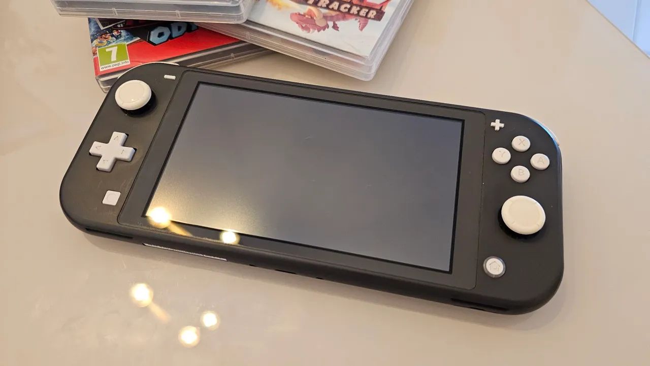 Nintendo Switch Lite Original Bloqueado - Foto 4