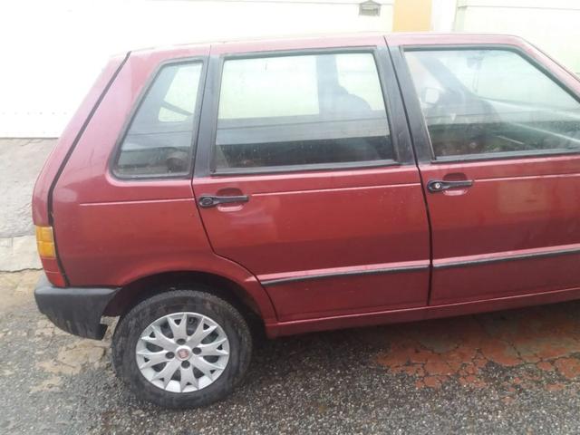 Vendo uno 2004 1.0 fire 4 portas contato: * - Foto 6