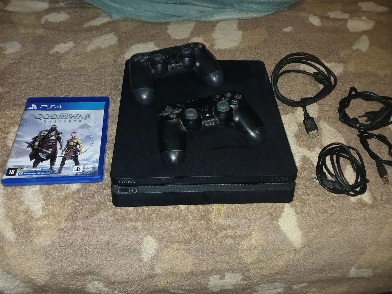 Vendo console  de ps4 SLIM com pouco uso vem 2 controles 2 AHD 2carregador e jogos incluso - Foto 2