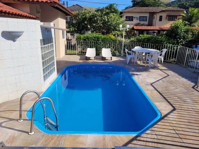 Maravilhosa casa com piscina em Garatucaia - Foto 7