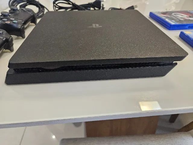Playstation 4 slim 1tb + 2 controles, gran turismo e ace combat - Foto 5