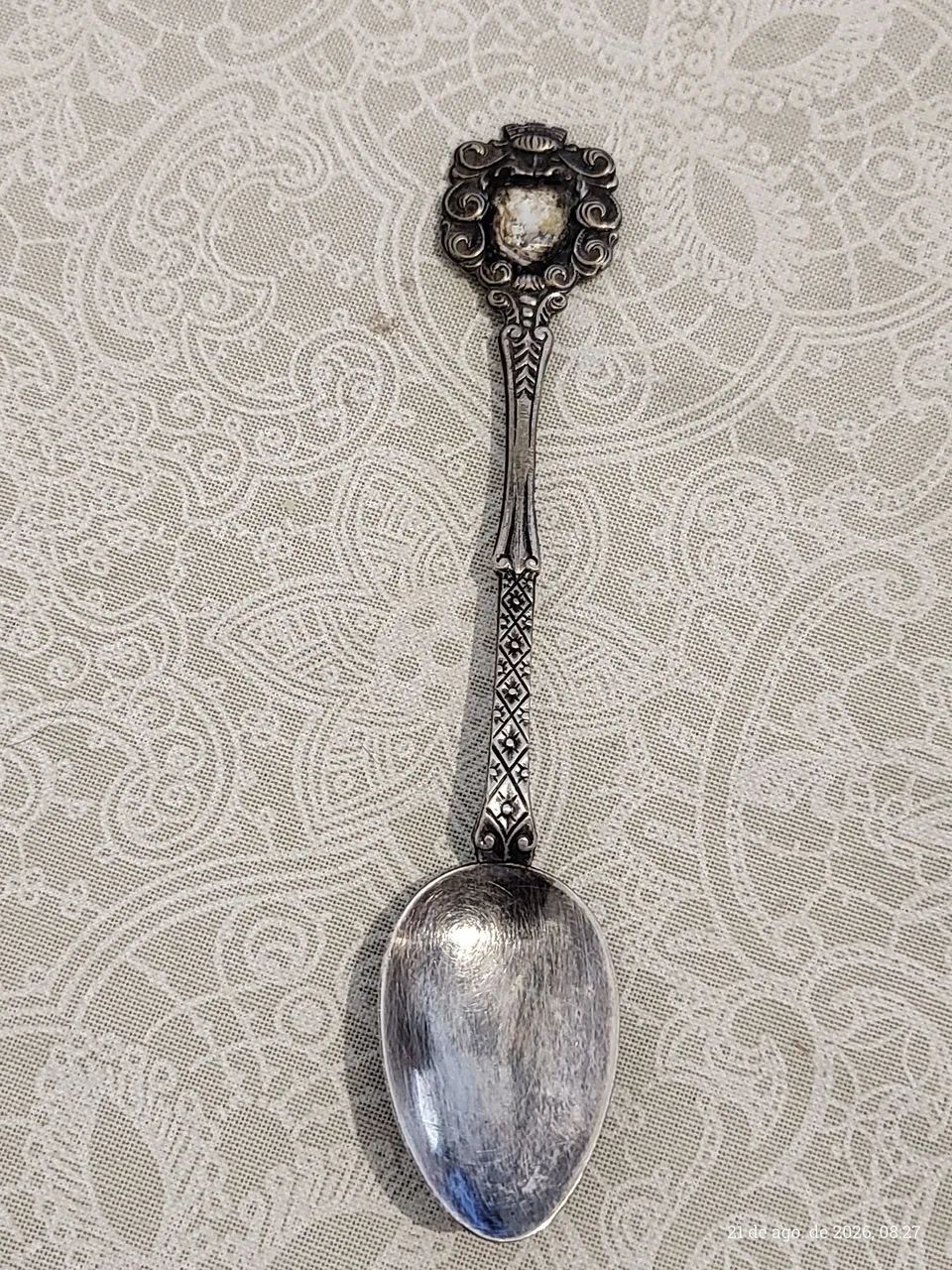 Colher de café única em metal prateado 