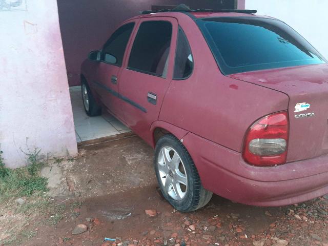 Vendo ou troco por moto corsa sedan valor 6.000
