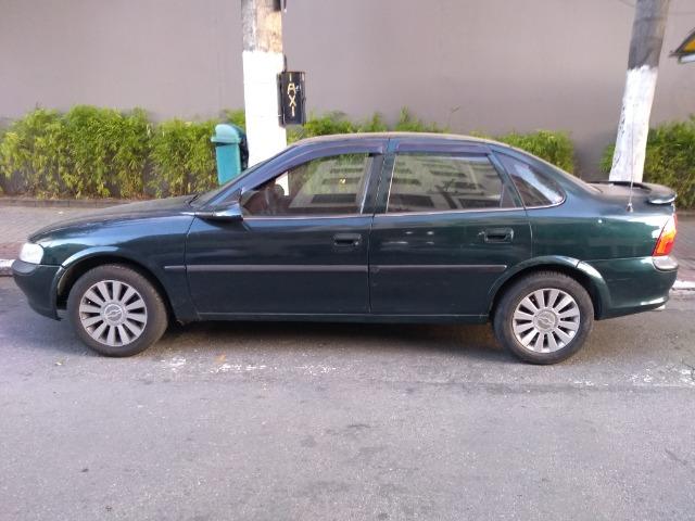 Vectra cd 97 com motor retificado, ABS, teto solar, sensor de ré e controle de tração! - Foto 10